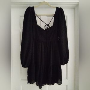 BERSHKA long sleeve black mini dress.